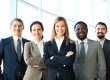 Smiling diverse business team in office