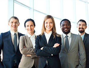 Smiling diverse business team in office Smiling diverse business team in office