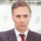 Businessman headshot in suit and red tie Businessman headshot in suit and red tie